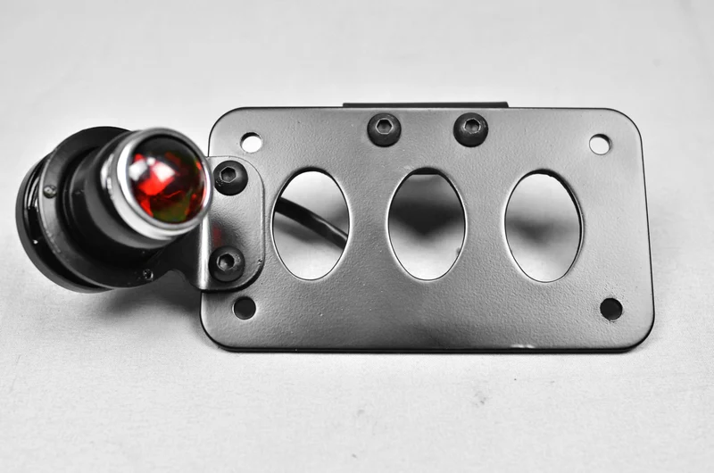 Seitlicher Kennzeichenhalter mit Lichtern